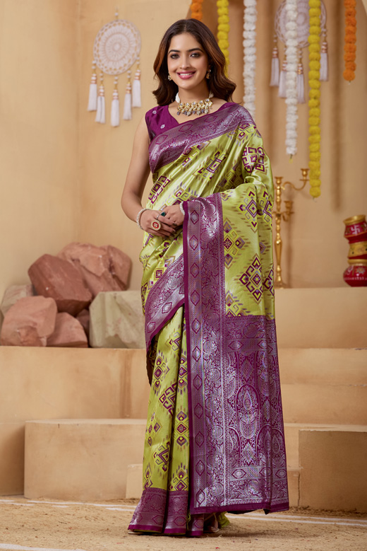 Woven Design Zari Patola Saree Woven Design Zari Patola Saree + Elevate your ethnic style with this stunning lime green burgundy woven design zari patola saree, a perfect blend of tradition and elegance. Crafted in luxurious silk saree fabric, this new saree features intricate zari detailing that adds a rich and festive touch to your look. This patola saree silk design showcases beautiful shades like parrot green saree, bottle green saree, and peacock green saree tones, making it a versatile addition to your saree collection. Ideal for weddings and celebrations, this designer silk saree reflects timeless craftsmanship.