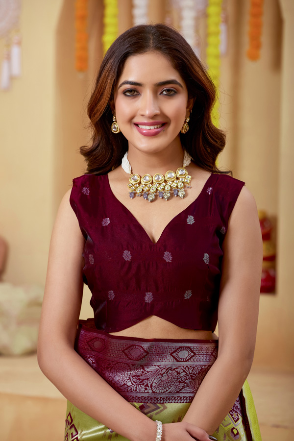 Woven Design Zari Patola Saree Woven Design Zari Patola Saree + Add elegance to your ethnic collection with this stunning green, chiku maroon and burgundy patola saree, inspired by rich heritage and modern style. This beautiful drape reflects shades like lime green saree, pista green saree, mint, pastel, and parrot green saree, blended with deeper tones of bottle green saree, leaf green saree, grass green saree, emerald, and gold green saree. The overall look gives a luxurious Golden Lime zari finish, perfect for festive wear. Designed with a premium woven design saree with zari border, this saree showcases the artistry of traditional patola saree weaving. The intricate detailing and subtle buti pattern enhance its beauty, giving it the richness of a classic banarasi saree and elegant handloom saree. This patola silk saree is ideal for saree traditional styling and modern designer saree for wedding looks.